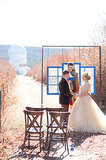 With an observatory setting the scene, the couple is married by an officiant clad in a Fourth Doctor scarf. 
Source: Candice Benjamin Photography
