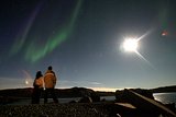 In August 2007, tourists checked out the aurora borealis in Greenland.
