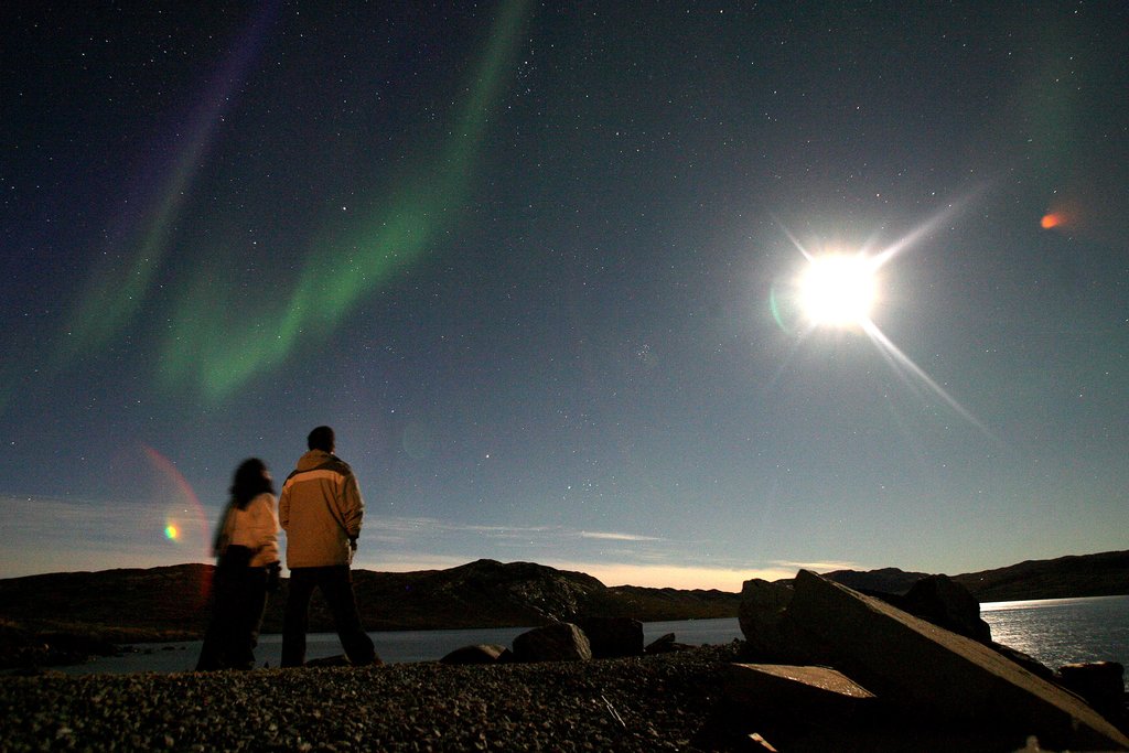 In August 2007, tourists checked out the aurora borealis in Greenland.
