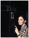 "And here's me at the front door. Helpfully, I'm pointing out the number." — Louise Brealey who plays Molly Hooper.
Source: Twitter user louisebrealey
