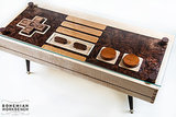 Stop everything, because compared to similar Nintendo controller coffee tables, this wood one ($395) is a steal. 
