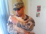 Excited Cat Welcomes Home Its Soldier Owner (Video)