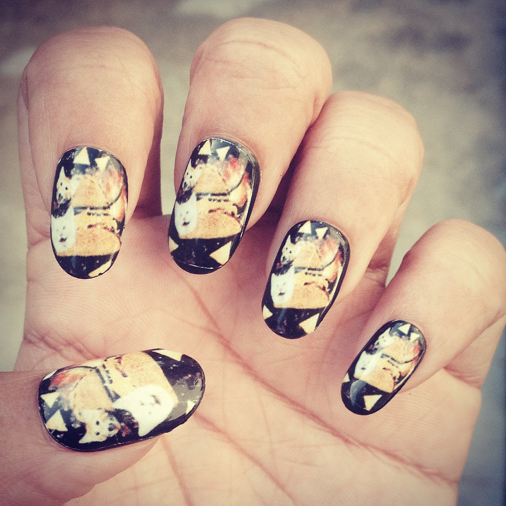 The question isn't, "Why are there cats in tacos flying through space on your fingers?" The question is, "Why aren't there cats in tacos flying through space on everyone's fingers?" The interstellar kitty nail wraps are $6 for a set of 20. 
