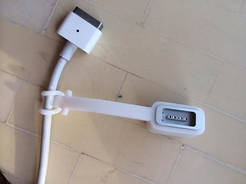 Genius alert! MagCozy ($10) is a "leash" that fits both original T-style and revised L-style Apple power adapters so you and your roommates can use the same charger whether you have a MacBook Pro or Air. 
Photo: Annie Gabillet
