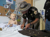 Indiana Toddler Battling Cancer Is Sworn in as Sheriff's Deputy