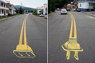 Street Artist Peter Gibson Paints Electrical Plugs on the Road